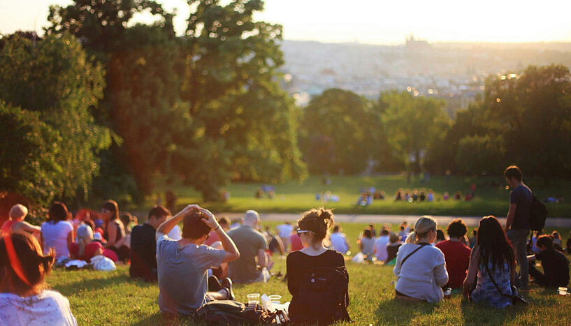 Picture of people sitting on the grass