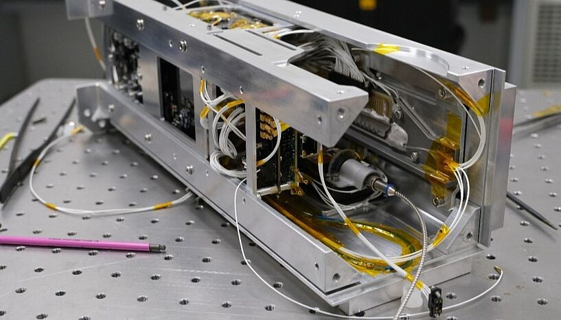 Fig. 2: Picture of the inside of the satellite payload during the assembly.

